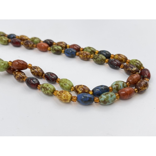 2334 - Two mid 20th century glass beaded necklaces, one Millefiori possibly by Murano and one Scottish agat... 