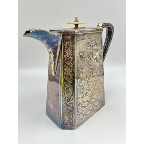 273 - An antique J & Co. EPNS coffee pot with bird and floral design - approx. 20cm high