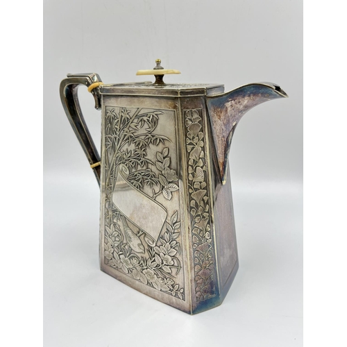 273 - An antique J & Co. EPNS coffee pot with bird and floral design - approx. 20cm high