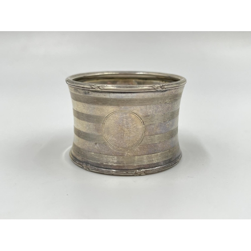 277 - Three hallmarked Birmingham silver napkin rings, dated 1921 - approx. gross weight 62 grams