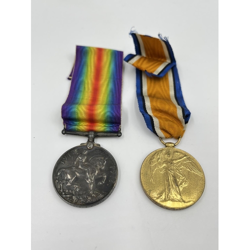 66 - A collection of ephemera and militaria to include WWI medal pair presented to PTE. J. F. Bibby of th... 