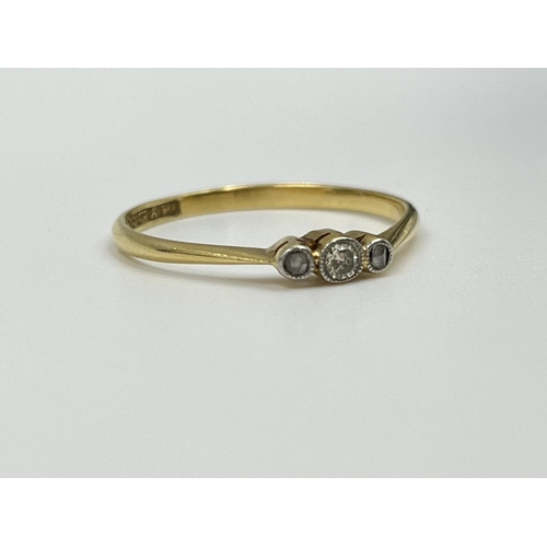 2360 - An 18ct gold and platinum diamond trilogy ring, size Q½ - approx. gross weight 1.66 grams