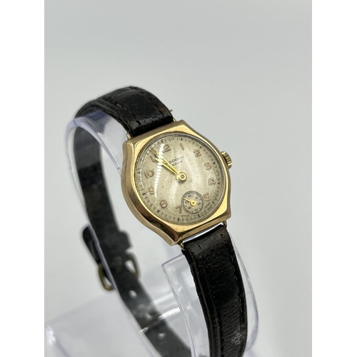 2405 - A W. Benson of London 9ct gold cased mechanical women's wristwatch with brown leather strap - approx... 