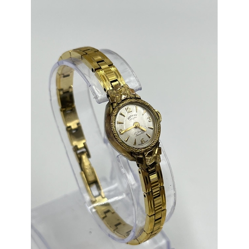 2409 - Three vintage women's wristwatches, Revue 9ct gold cased quartz with black leather strap, Rotary gol... 