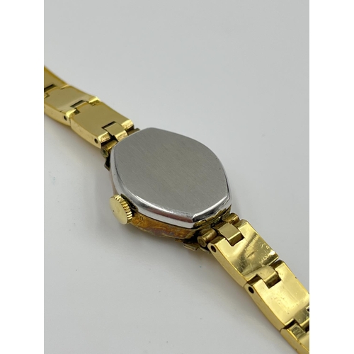 2409 - Three vintage women's wristwatches, Revue 9ct gold cased quartz with black leather strap, Rotary gol... 