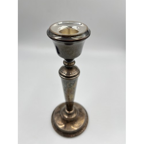 285 - A pair of hallmarked Birmingham silver weighted candlesticks by A. T. Cannon Ltd., dated 1974 - appr... 