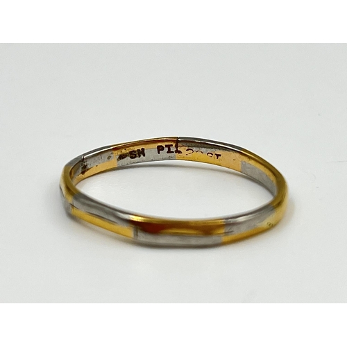 2330 - A 22ct gold and platinum ring, stamped 'SH PT_ 22ct', size N½ - approx. gross weight 2.73 grams