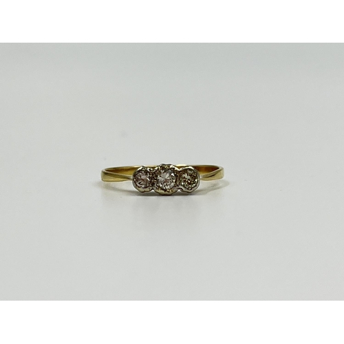 2331 - An 18ct gold and platinum diamond trilogy ring, size P - approx. gross weight 1.82 grams