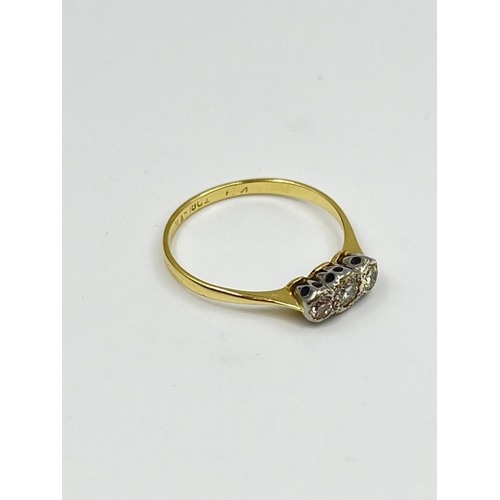 2331 - An 18ct gold and platinum diamond trilogy ring, size P - approx. gross weight 1.82 grams