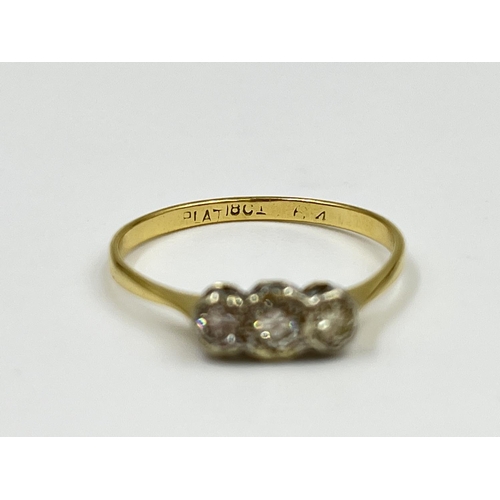 2331 - An 18ct gold and platinum diamond trilogy ring, size P - approx. gross weight 1.82 grams