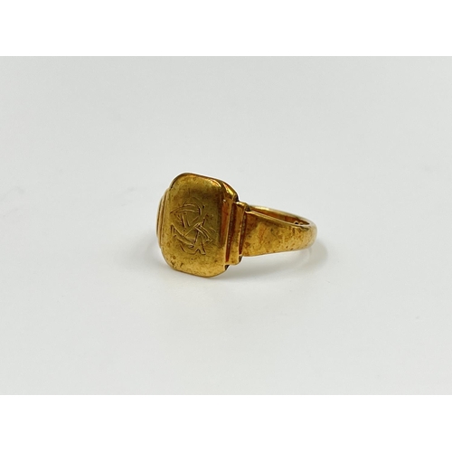 2335 - A hallmarked Birmingham 9ct gold signet ring, dated 1954, size S - approx. gross weight 4.47 grams