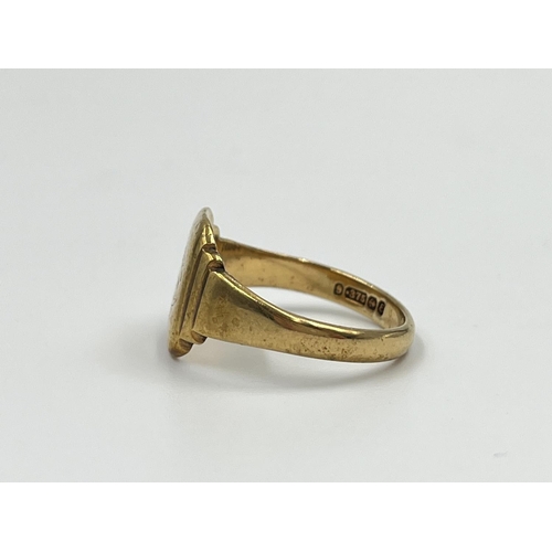 2335 - A hallmarked Birmingham 9ct gold signet ring, dated 1954, size S - approx. gross weight 4.47 grams