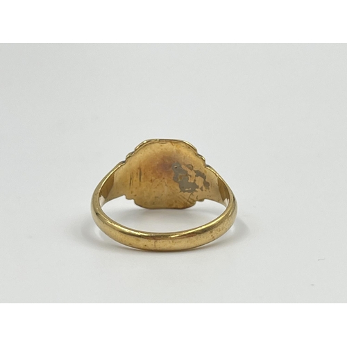 2335 - A hallmarked Birmingham 9ct gold signet ring, dated 1954, size S - approx. gross weight 4.47 grams