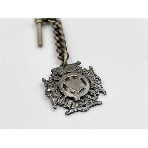 2348 - An antique white metal 29cm Albert chain with T bar, key and hallmarked Birmingham silver fob, dated... 