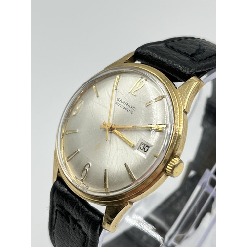 2398 - A vintage Garrard automatic men's 34mm wristwatch