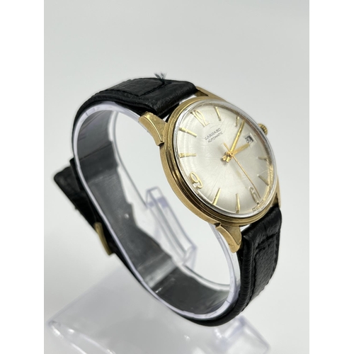 2398 - A vintage Garrard automatic men's 34mm wristwatch