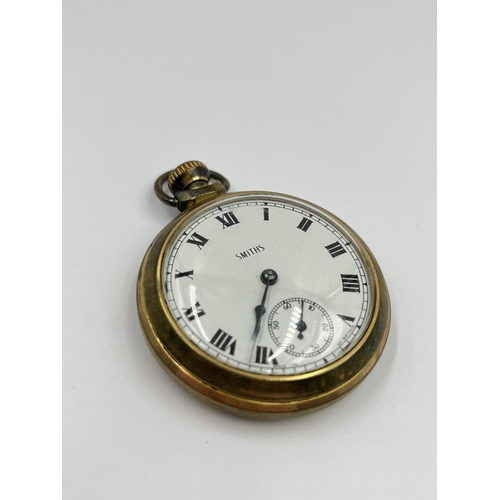 2400 - A Smiths brass cased mechanical pocket watch