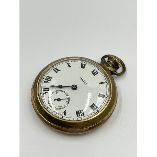 2400 - A Smiths brass cased mechanical pocket watch