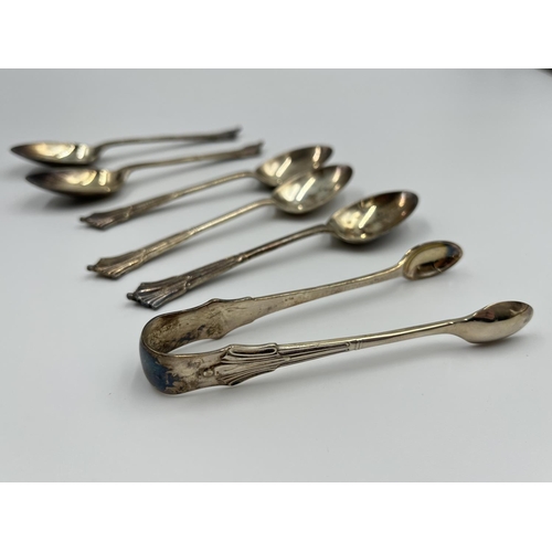 283 - A cased set of five Walker & Hall hallmarked Sheffield silver teaspoons with matching sugar tongs, d... 