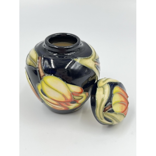 421A - A boxed Moorcroft miniature jar and cover - approx. 6cm high