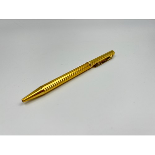 126 - Three writing instruments, one Parker ballpoint pen, one Parker pencil and one gold tone retractable... 