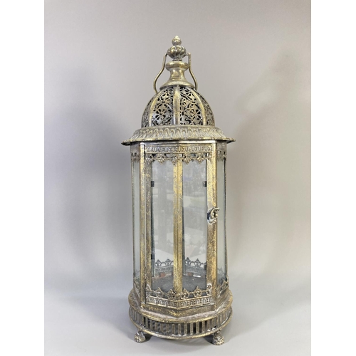 510 - A pair of Middle Eastern style brass effect and glass lanterns - approx. 55cm high