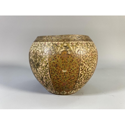 512 - A Middle Eastern engraved brass and enamel vase - approx. 12cm high x 11.5cm diameter