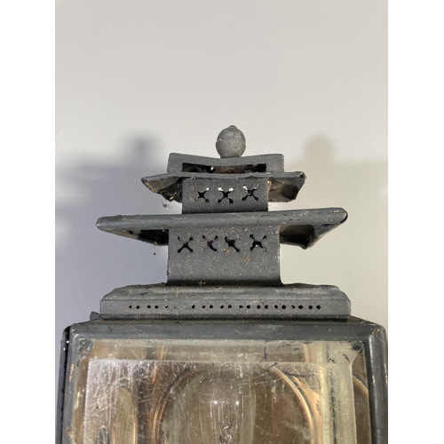 516 - A vintage black metal coach lantern - approx. 52cm high