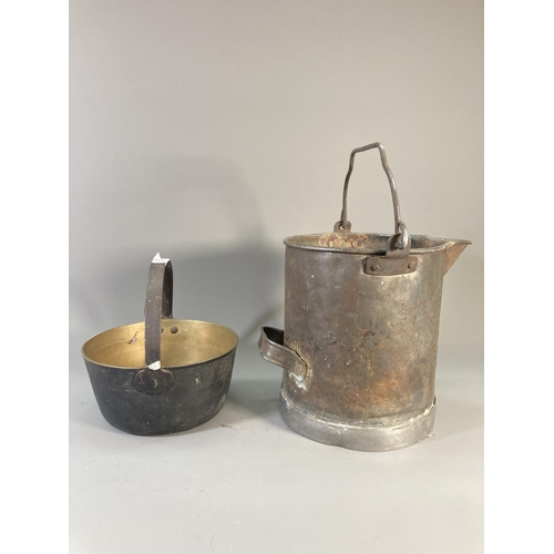 525 - Two pieces of metalware, one Victorian brass preserve pan - approx. 23cm diameter and one vintage ga... 