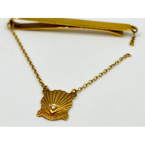 2358 - A hallmarked Birmingham 9ct gold tie clip, dated 1971 with 9ct gold and single diamond '25 Years Ser... 