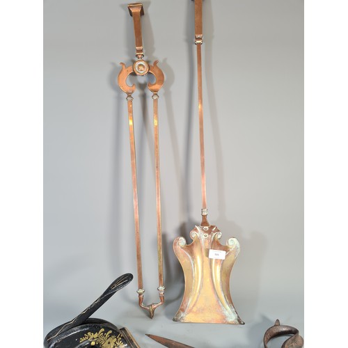 531 - Four pieces of antique metalware to include Arts & Crafts copper fire tongs and shovel, T. Wilkinson... 