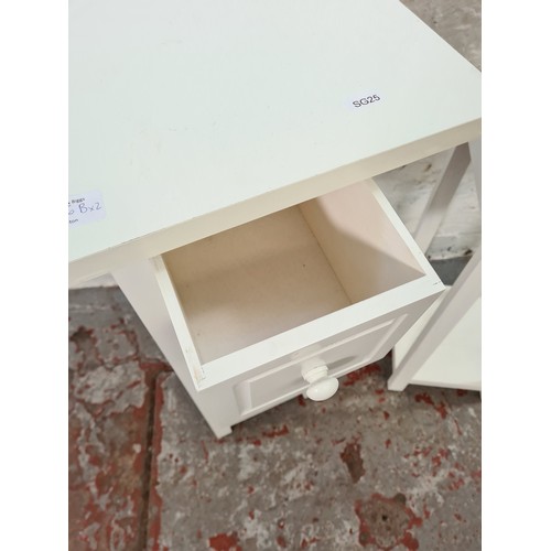 1176B - A pair of modern white painted square top two-tier bedside tables - approx. 71cm high x 32cm square