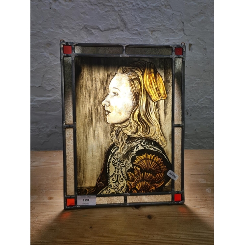 1194 - A Dutch style hand painted portrait of a female on stained glass - approx. 33cm high x 25cm wide