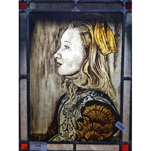 1194 - A Dutch style hand painted portrait of a female on stained glass - approx. 33cm high x 25cm wide