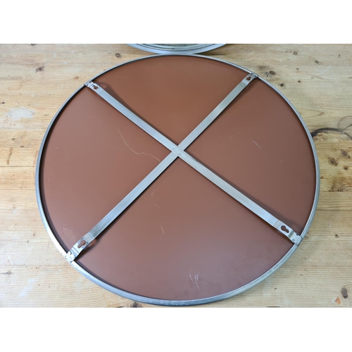 1198 - A pair of industrial style brushed steel framed circular wall mirrors - both approx. 70cm diameter