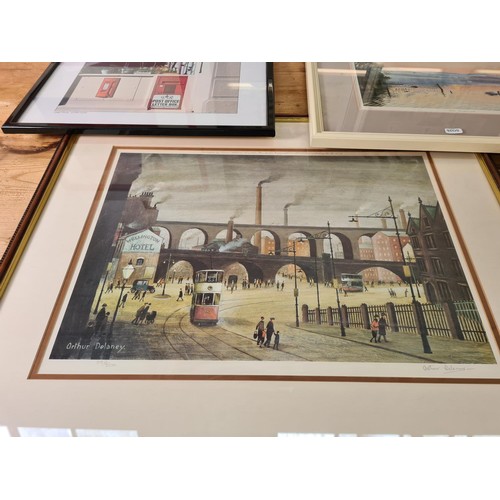 1214A - Six assorted framed prints to include limited edition 382/500 pencil signed Arthur Delaney of a Manc... 