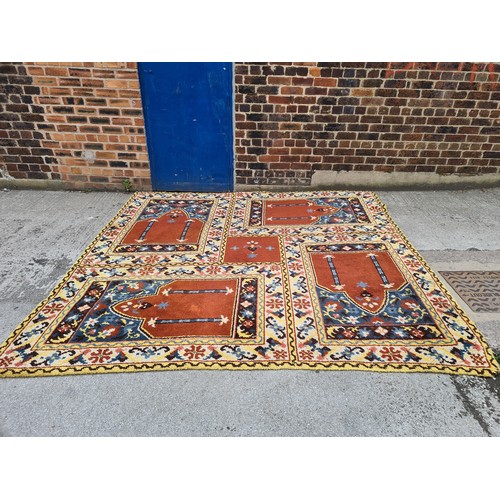 1181 - A mid 20th century multi coloured rug