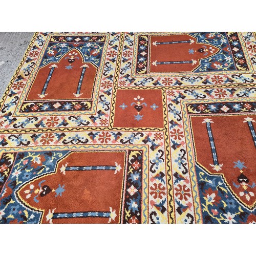 1181 - A mid 20th century multi coloured rug