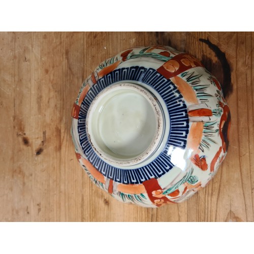 471A - Two pieces of late 19th/early 20th century Imari porcelain, one 25cm footed bowl with scalloped edge... 