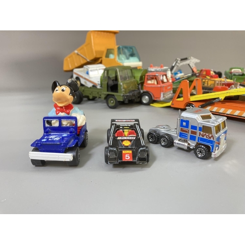 662 - A collection of assorted diecast model vehicles to include Dinky Johnston road sweeper, Corgi Wall's... 