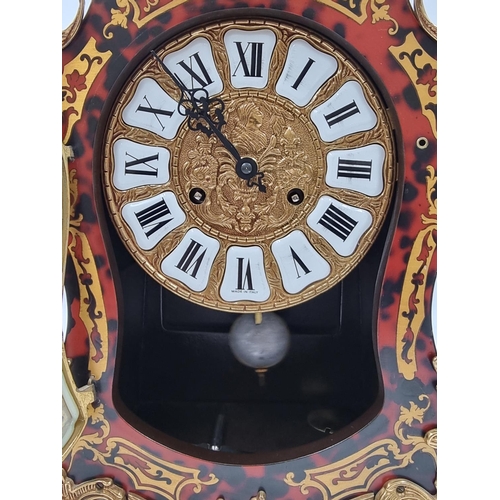 798 - An Italian Boulle type mantel clock with gilt metal decoration - approx. 57cm high x 30cm wide x 13c... 