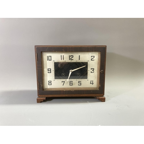 808 - An Art Deco mahogany cased chiming mantel clock with pendulum and key - approx. 23cm high x 27cm wid... 