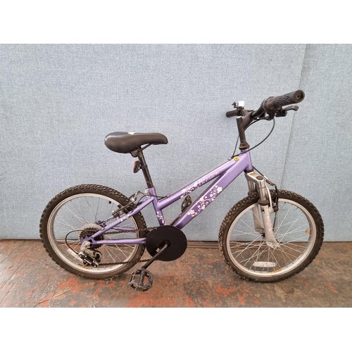 1623 - Two bikes, one Olympus Stratus town bike and one child's mountain bike