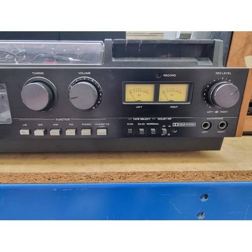 1287 - A Sony HMK-55B stereo music system comprising four band tuner/amplifier, cassette recorder and two s... 