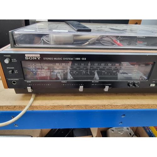 1287 - A Sony HMK-55B stereo music system comprising four band tuner/amplifier, cassette recorder and two s... 