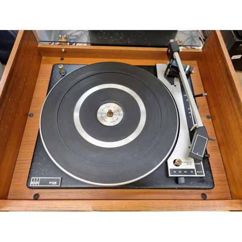 1292 - A Ferguson record player comprising BSR P128 four speed turntable, amplifier and a pair of model 340... 