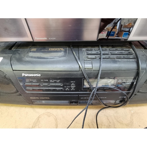 1296 - Two Panasonic items, one RX-DT5 CD player/twin cassette/radio with instruction manual and one SC-HC3... 