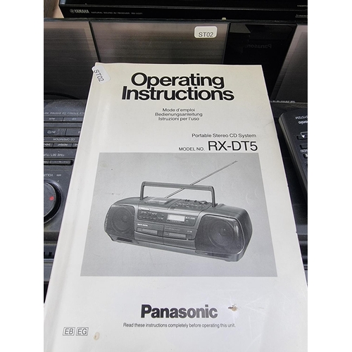 1296 - Two Panasonic items, one RX-DT5 CD player/twin cassette/radio with instruction manual and one SC-HC3... 