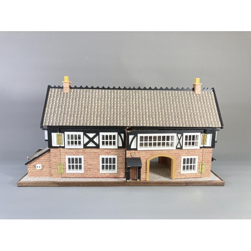 660 - A handmade traditional dolls house - approx. 37cm high x 69cm wide x 29cm deep