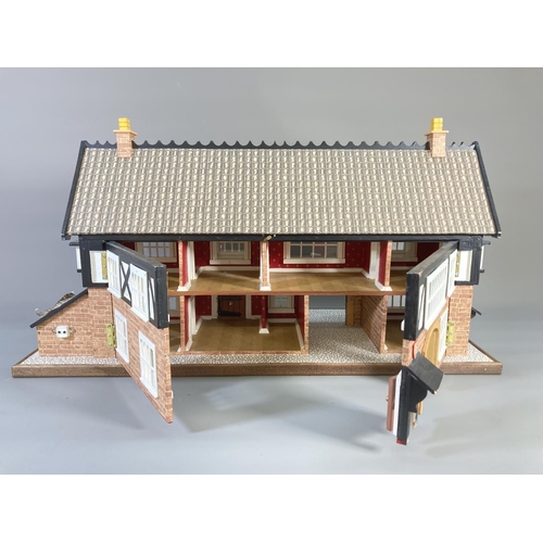 660 - A handmade traditional dolls house - approx. 37cm high x 69cm wide x 29cm deep